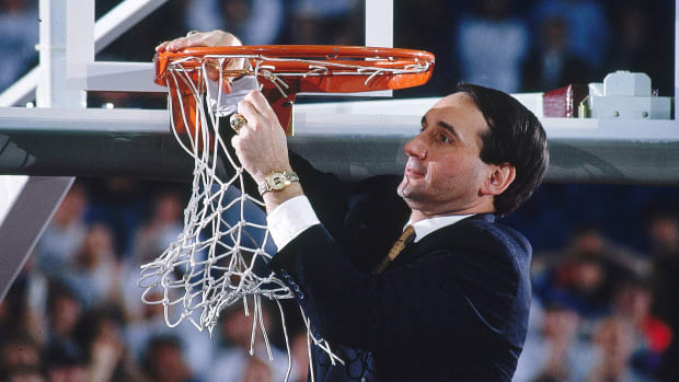 Coach K cuts the nets after Duke wins the 1992 NCAA title