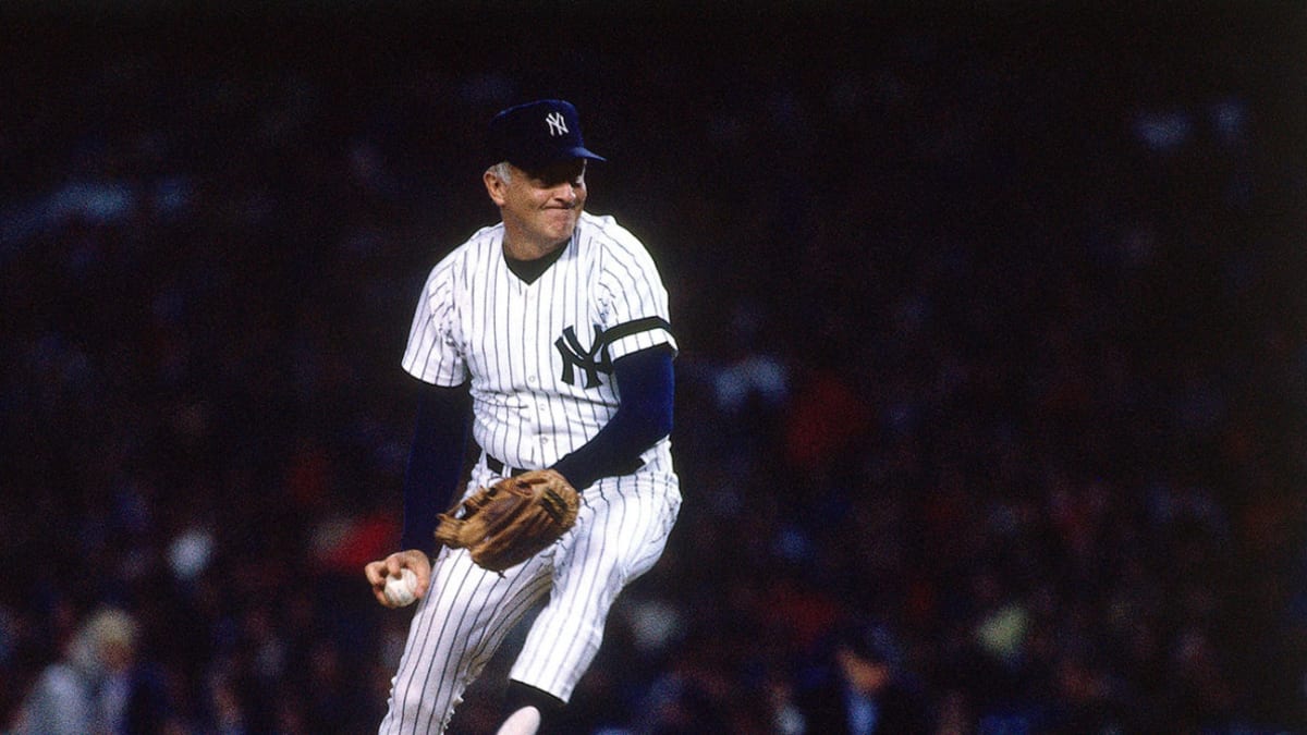 New York Yankees 45-year-old starter Phil Niekro directs his knuckler  toward the Chicago White Sox in New York on Wednesday, August 9, 1984.  Niekro allowed 10 vhitans on 10 nhhits, walking and