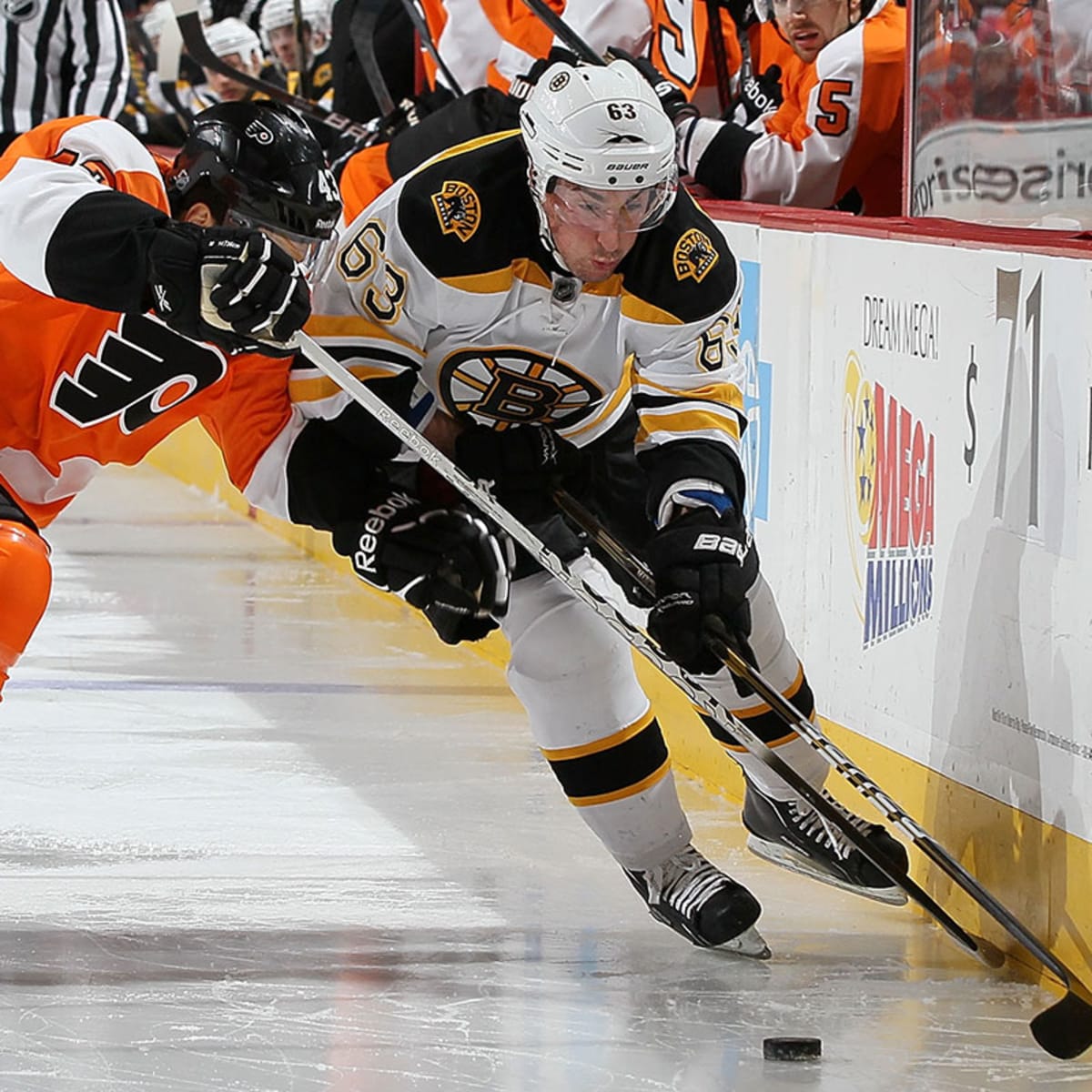 Boston Bruins' Brad Marchand draws criticism from his coach for