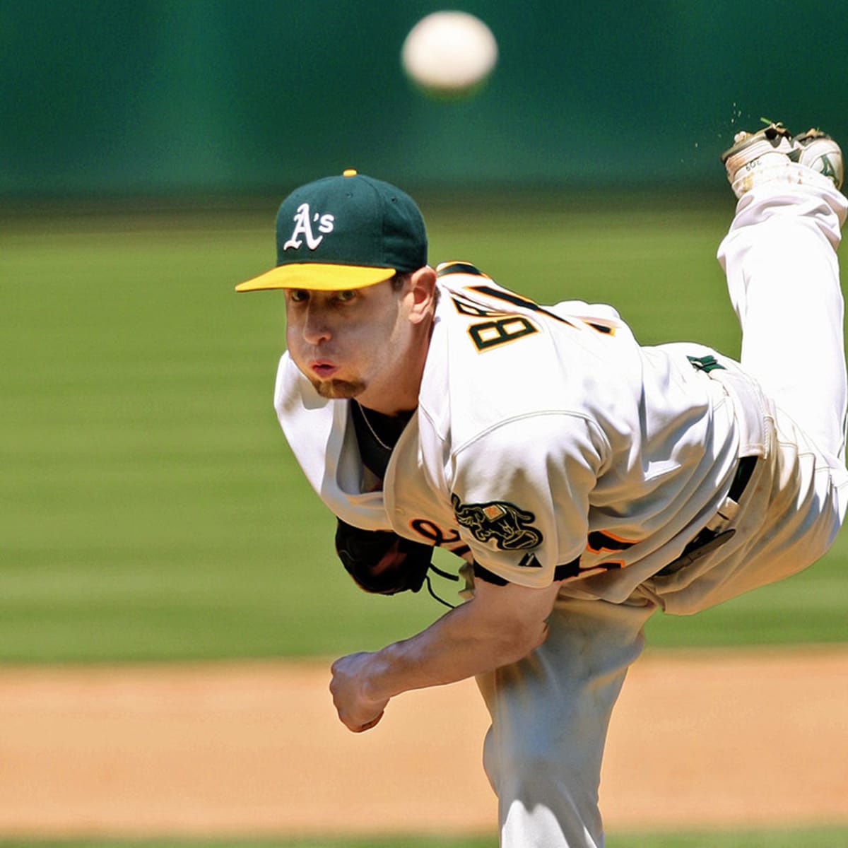 Former Oakland Athletics pitcher Dallas Braden wears a jersey of