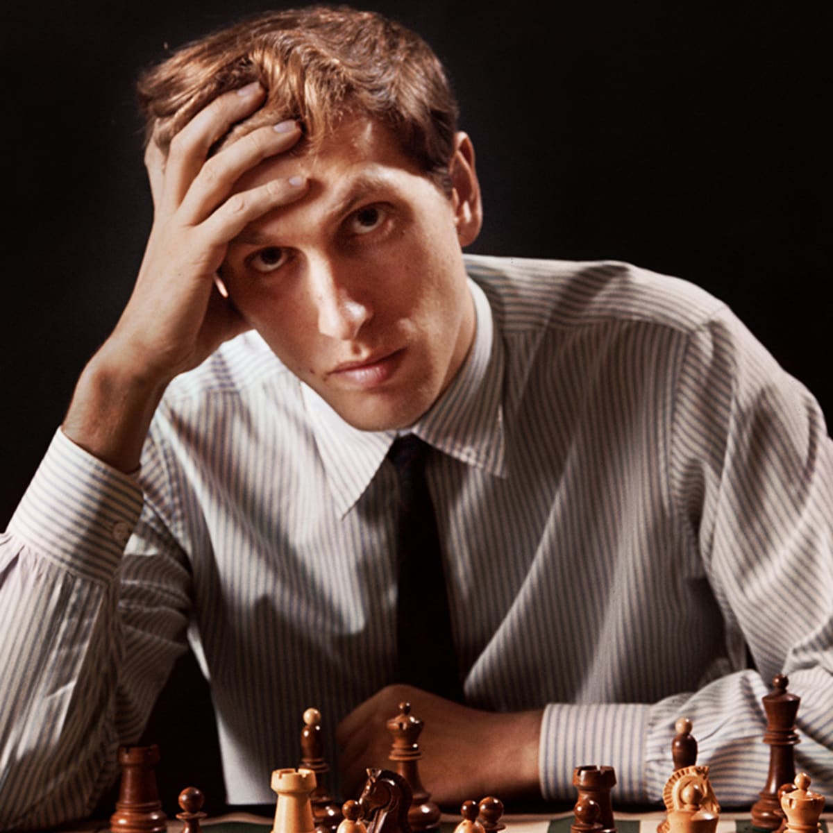 Bobby Fischer at Chess Board with Newspaper Bobby the Champ