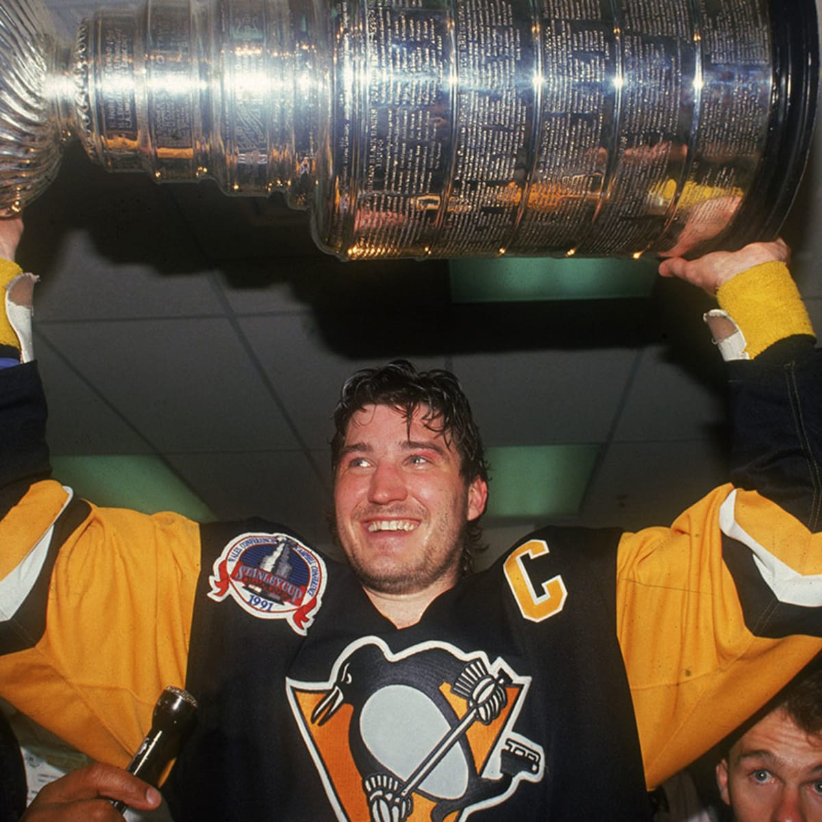 Stanley Cup's traveling tales span the globe, bottom of Lemieux's