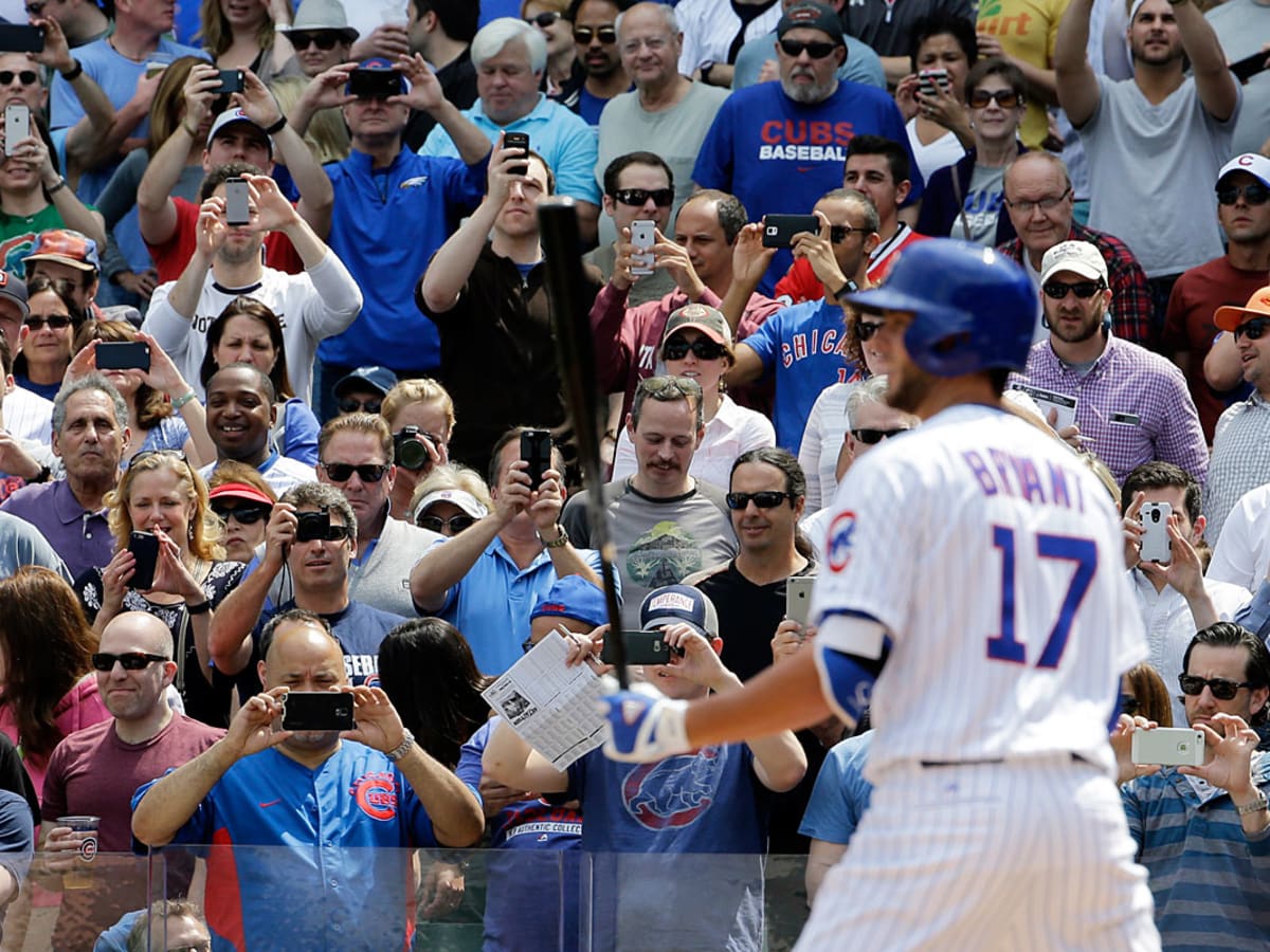 Cubs' Kris Bryant hit on helmet by pitch, leaves game