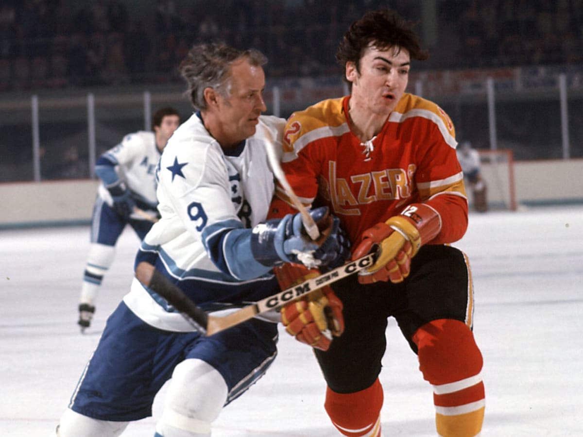 Mark Howe, left to right, Marty Howe, and Hockey Hall of Fame