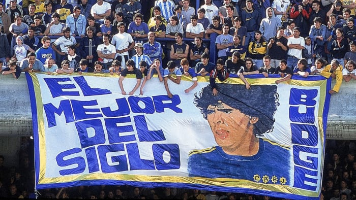 Argentina fans hang a Maradona banner