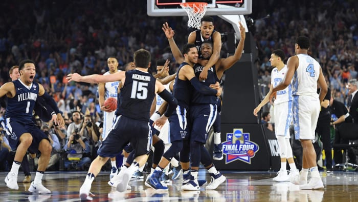 Villanova players mob Kris Jenkins after his title-winning shot
