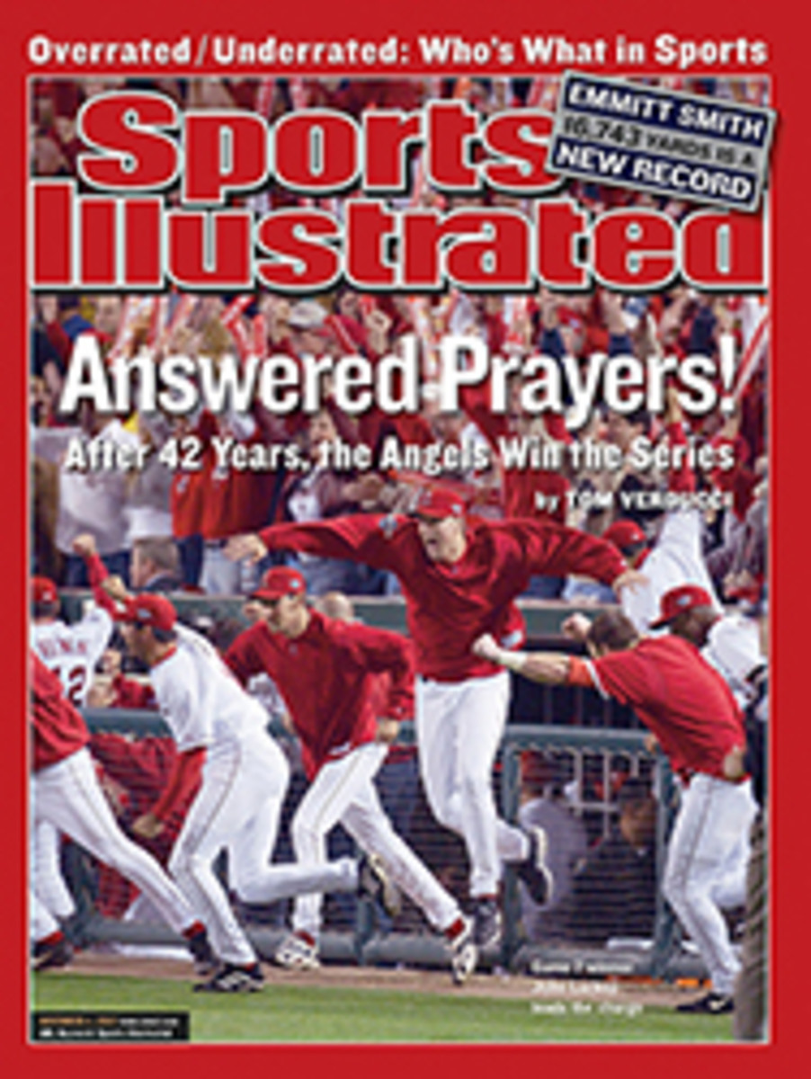 Classic Comeback Thanks to a historic Game 6 rally, the never-say-die  Angels stunned the Giants in seven to win the first World Series  championship in their 42-year history - Sports Illustrated Vault