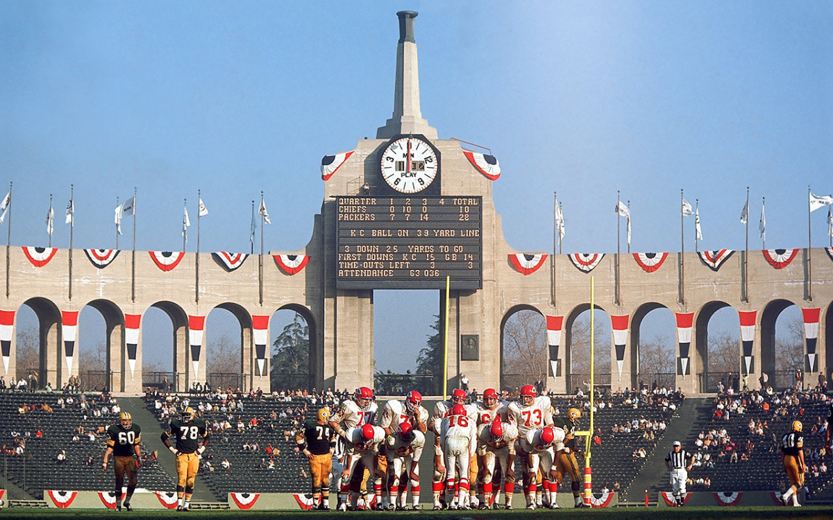 ED BUDDE KANSAS CITY CHIEFS ACTION SIGNED 8x10