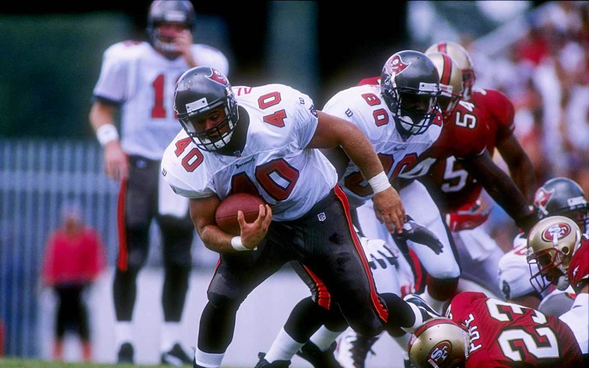 San Francisco 49ers wide receiver Jerry Rice takes off with a 51 yard Steve  Young touchdown pass during the second quarter of their game with the Tampa  Bay Buccaneers at Tampa Stadium