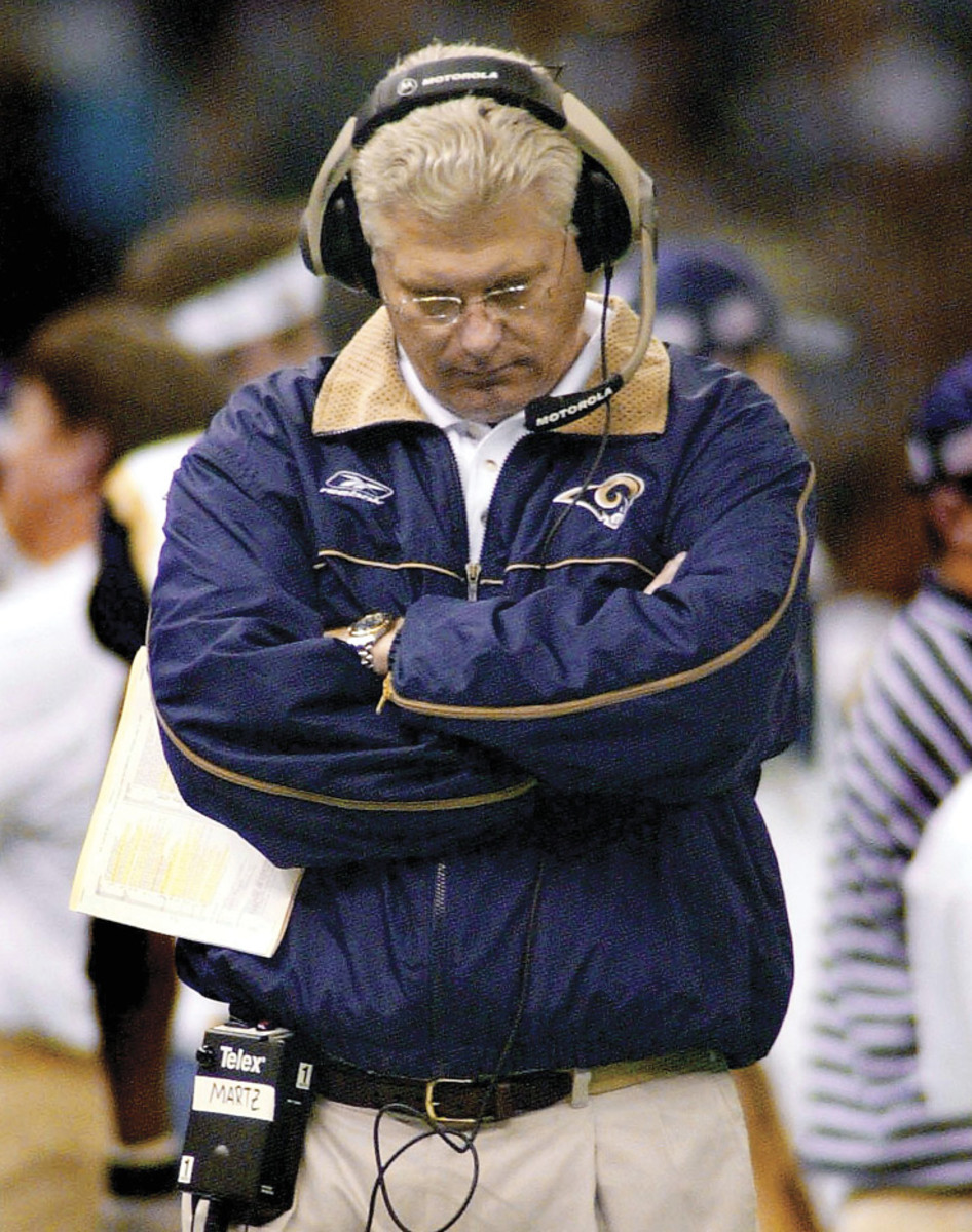 ST. LOUIS’S ARC Martz (above) and the Rams lost two years after they tackled Dyson one yard short (below).