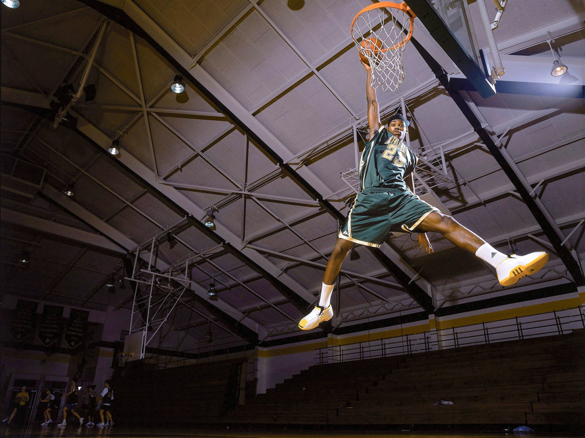 SI Photo Blog — LeBron James catches a football prior to the